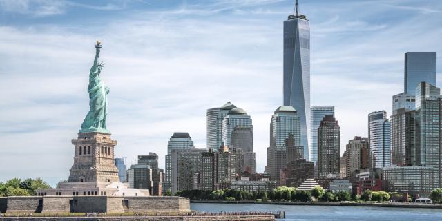 The Statue of Liberty with One World Trade Center background, Landmarks of New York City, USA