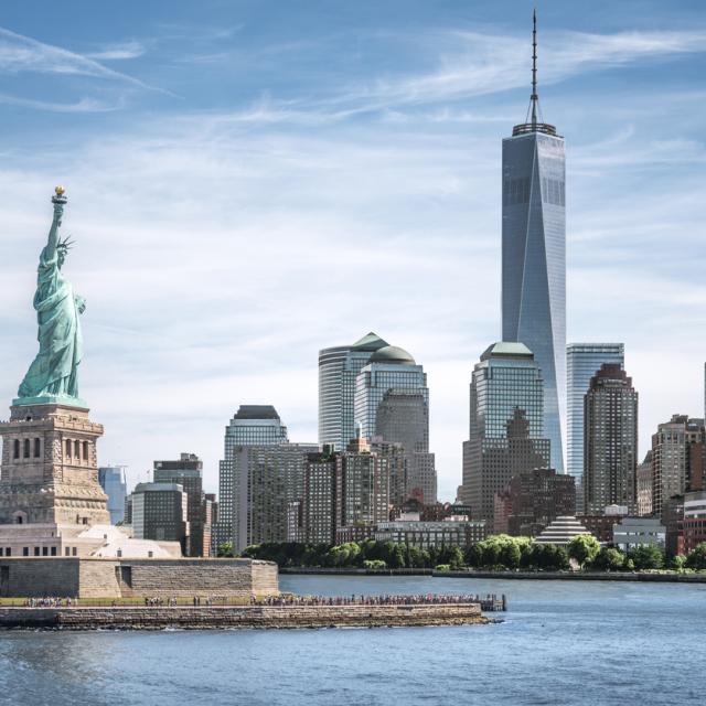 The Statue of Liberty with One World Trade Center background, Landmarks of New York City, USA