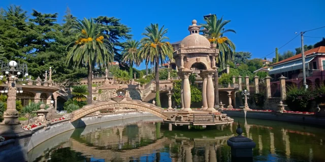 Imperia, Italy - September 12, 2014: the pond and the decorative composition of Villa Grock on sunny weather