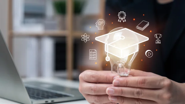 E-learning graduate certificate program concept, businessman hand holding light bulb with Internet education course degree, study knowledge, creative thinking idea, problem solving solution, AI.